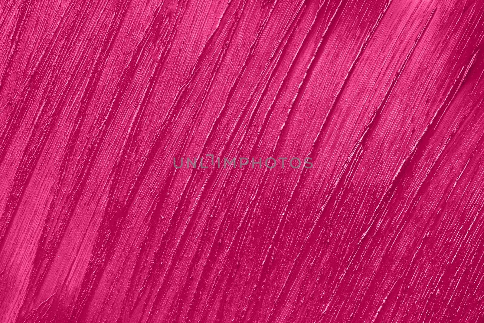 Beauty product sample closeup. Purple cosmetics smear pattern. Liquid lipstick cosmetic. Pink swatch matt backdrop. by photolime