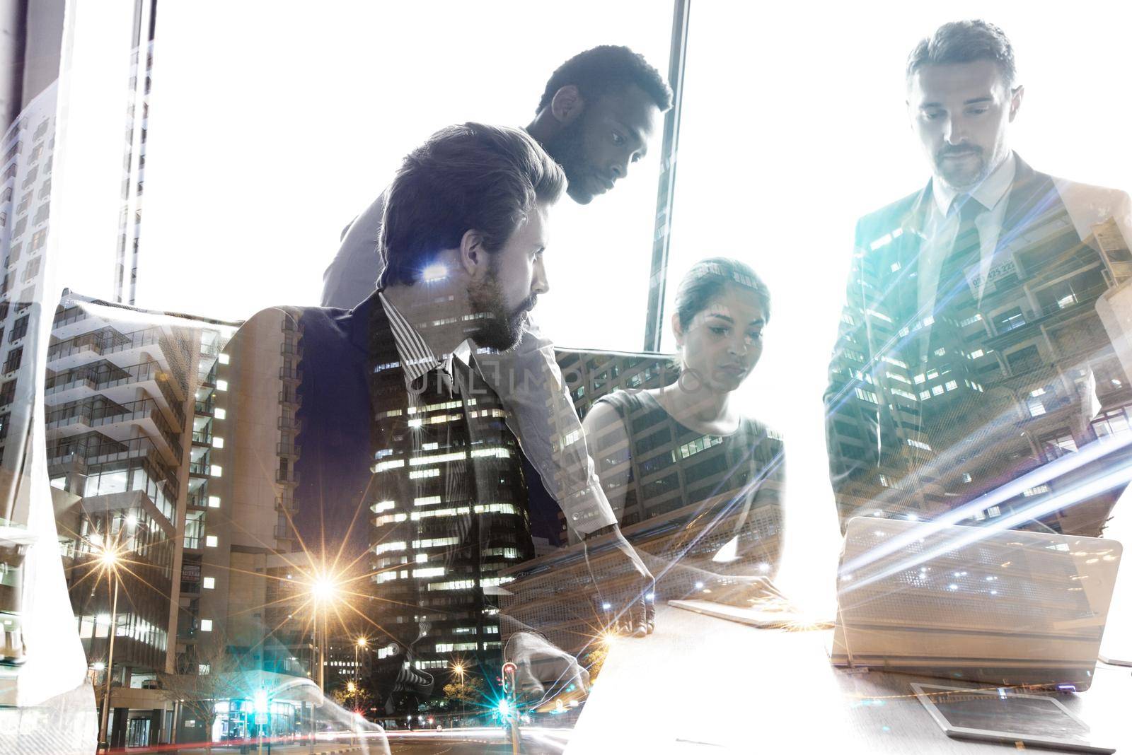 This companys success is owed to its staff. Multiple exposure shot of colleagues in a meeting superimposed over a city background