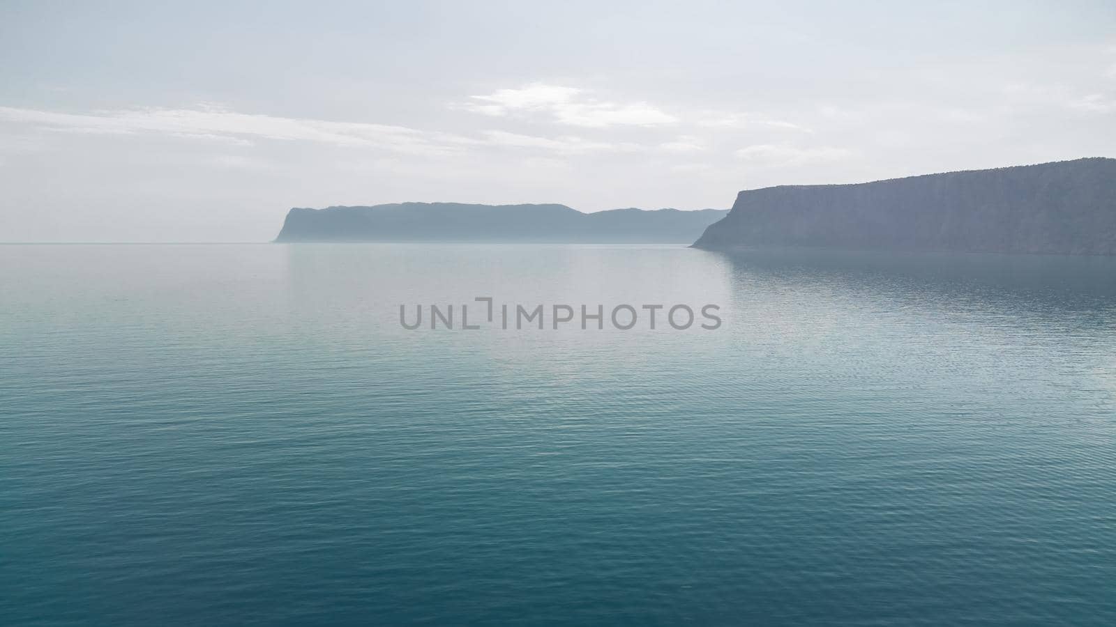Sea landscape with rocky coastline on sunset time with cloudy sky. Yachts in the Sea on a background of rocky shores. The concept of perfect place for summer travel and rest.