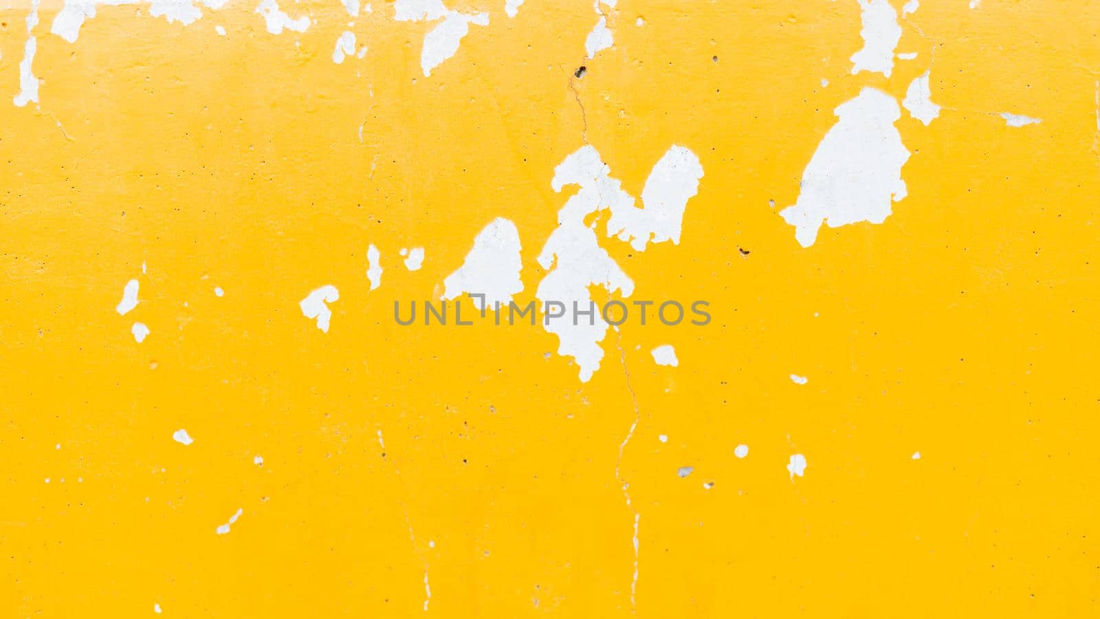 Wall yellow painted peel out texture background by Bilalphotos