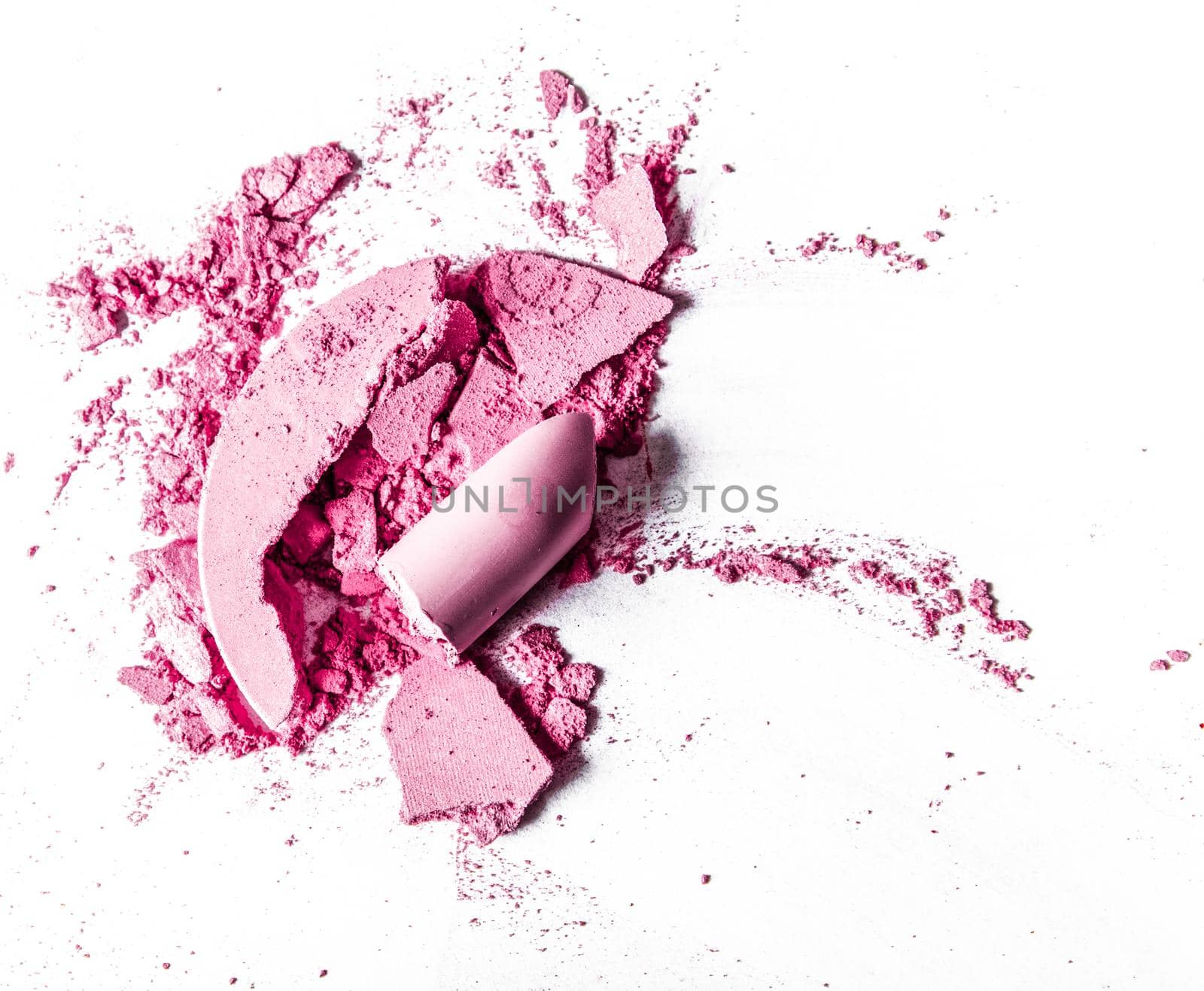 Beauty texture, cosmetic product and art of make-up concept - Crushed eyeshadows, lipstick and powder isolated on white background