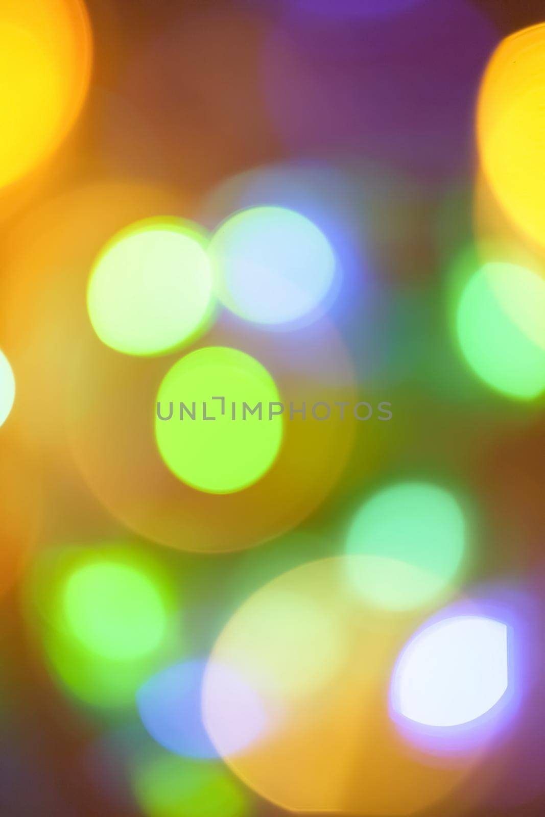 Colourful lights bokeh - abstract background, defocused overlay, bright colours concept