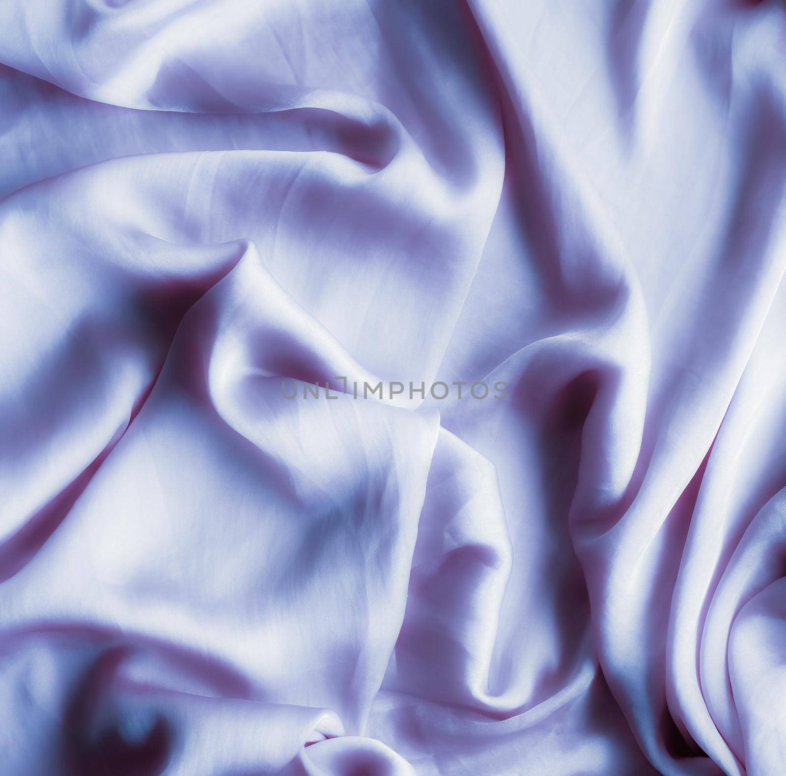 Elegant fabric texture, abstract backdrop and modern pastel colours concept - Purple soft silk waves, flatlay background