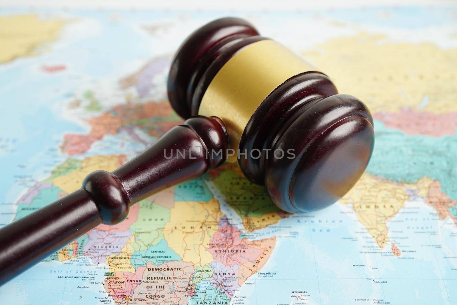 Bangkok, Thailand - May 15, 2022 Judges gavel on world map.