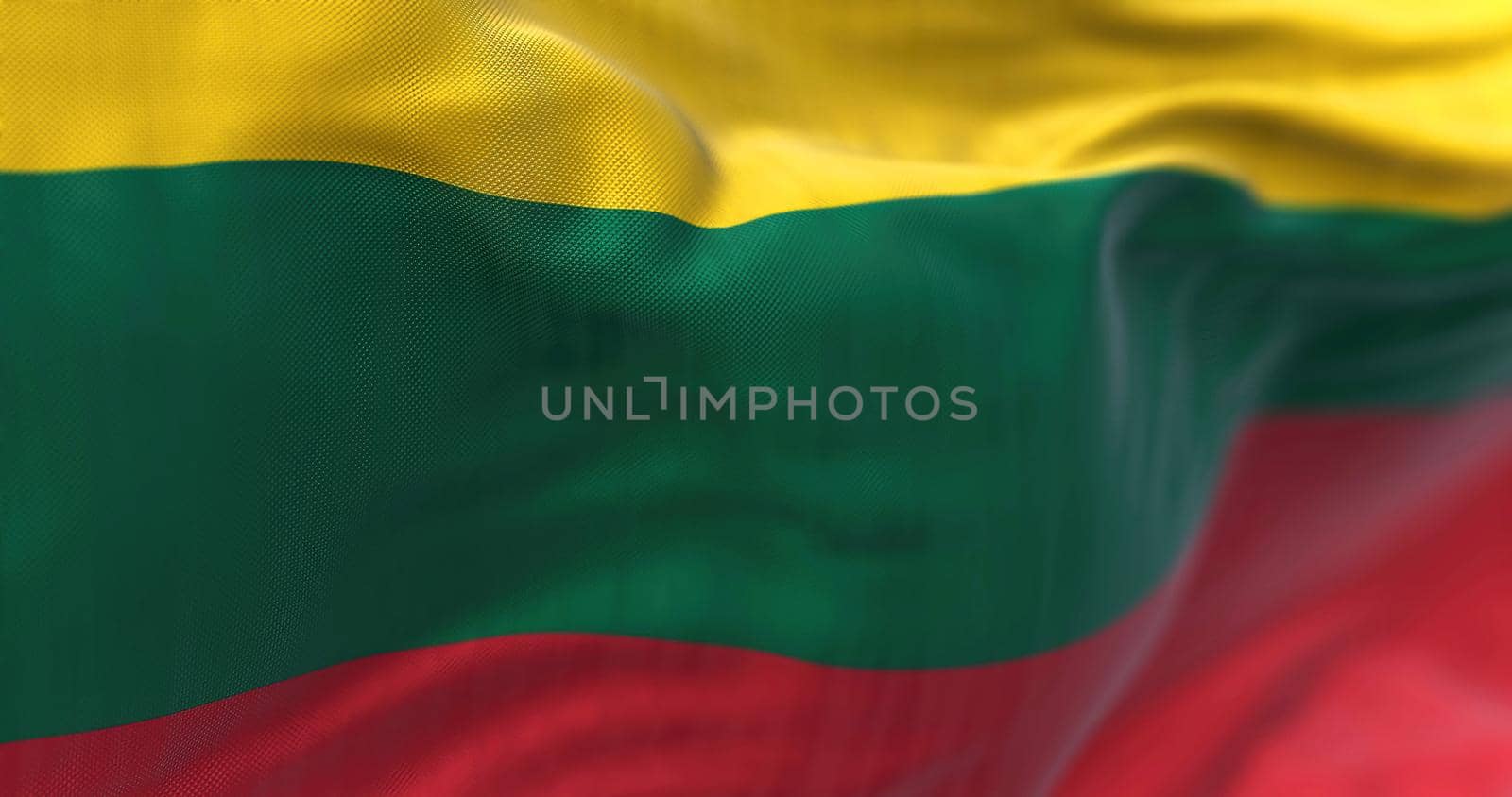 Close-up view of the national flag of Lithuania waving in the wind by rarrarorro