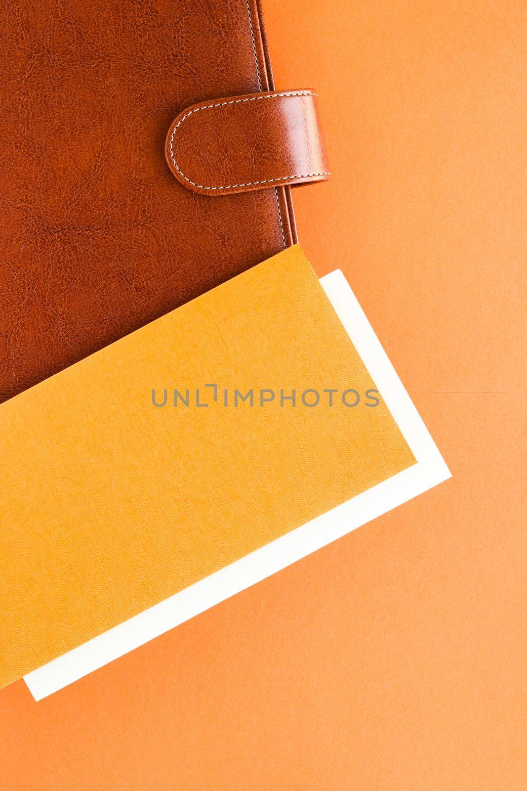 Modern workspace, productivity and corporate lifestyle concept - Luxury business brown brief-case on the office table desk, flatlay