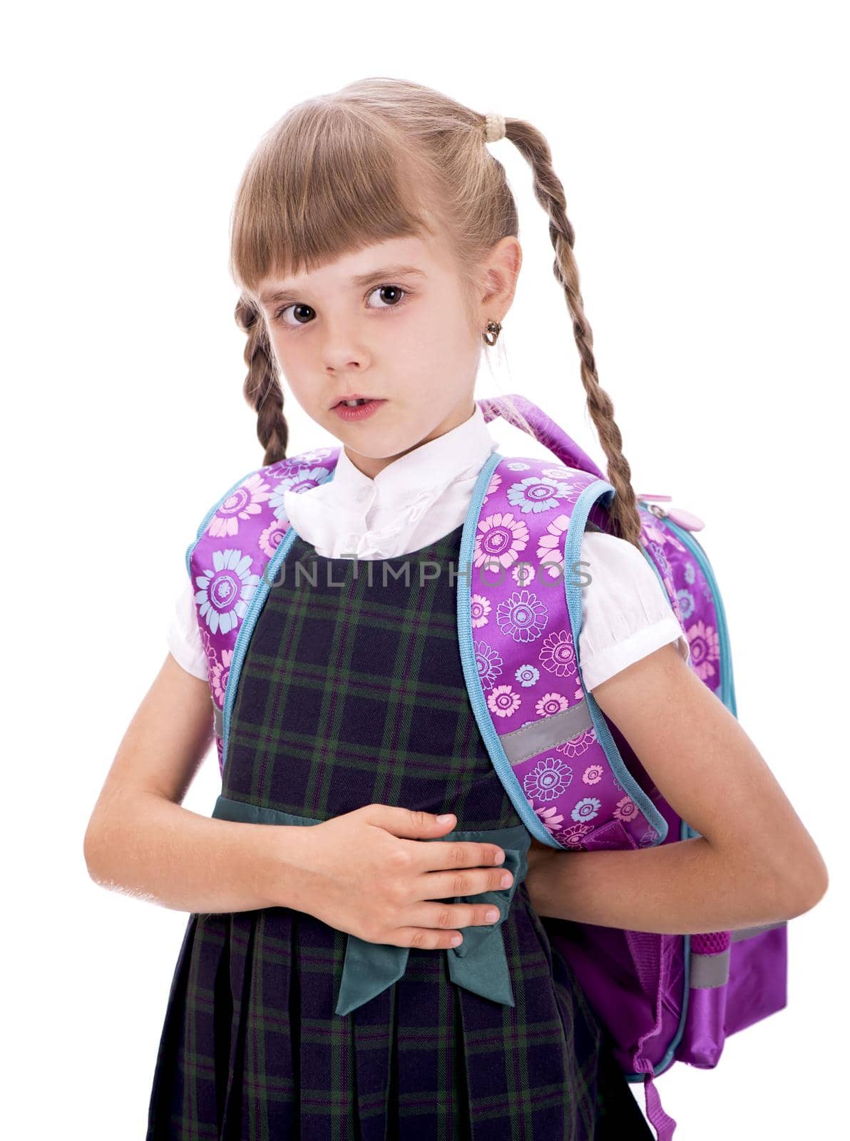 Adorable little schoolgirl with happy smile keeping arms crossed. Small schoolgirl looking nice in school uniform. Cute schoolgirl with long brunette hair and charming look. by aprilphoto