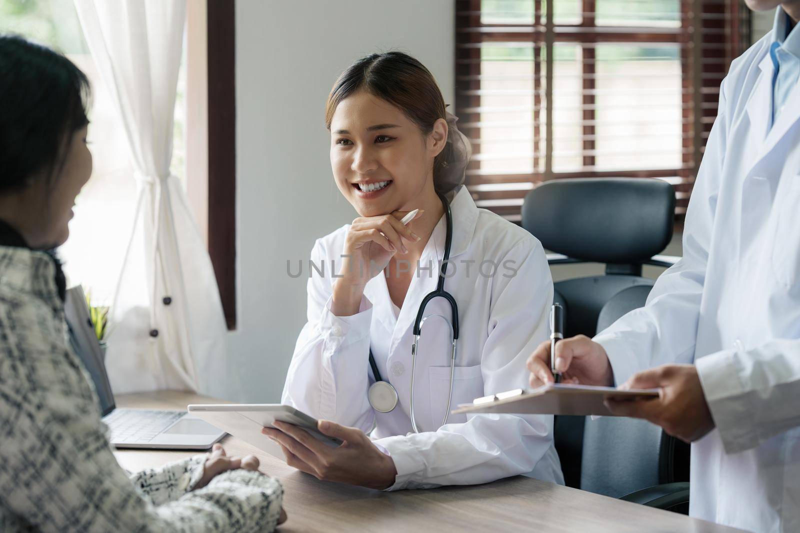 Doctor explain to patient about health care. Medicine and health care and insurance concept.