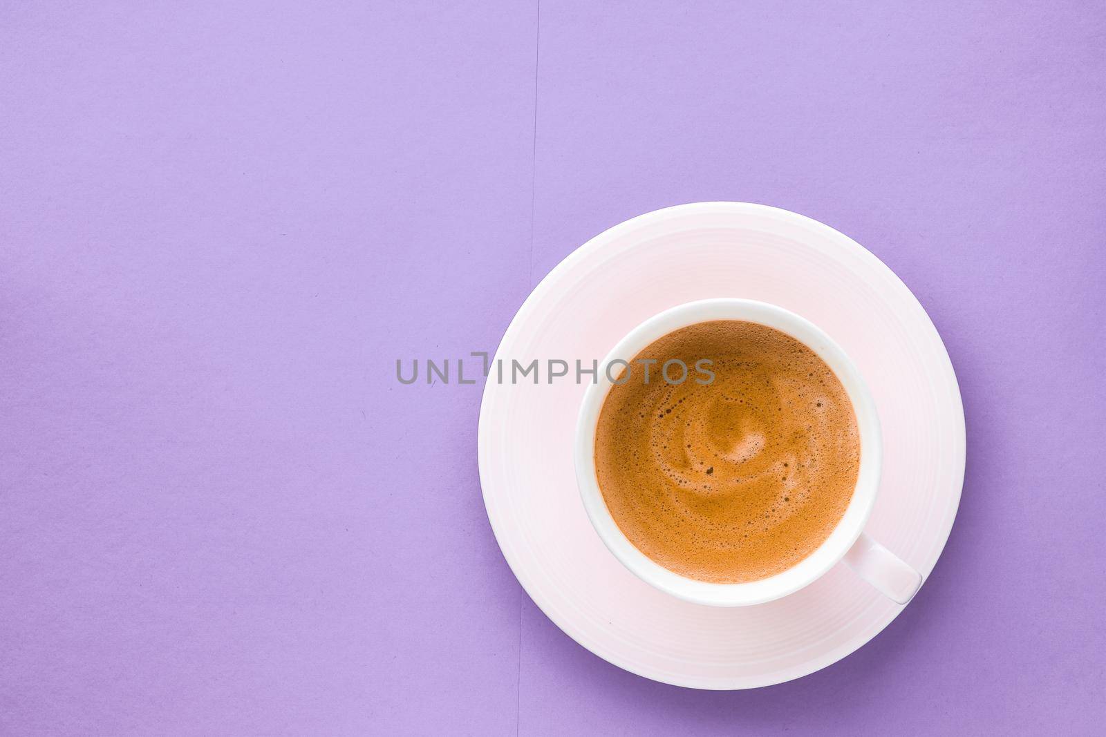 Breakfast, drinks and cafe menu concept - Coffee cup on purple background, top view flatlay