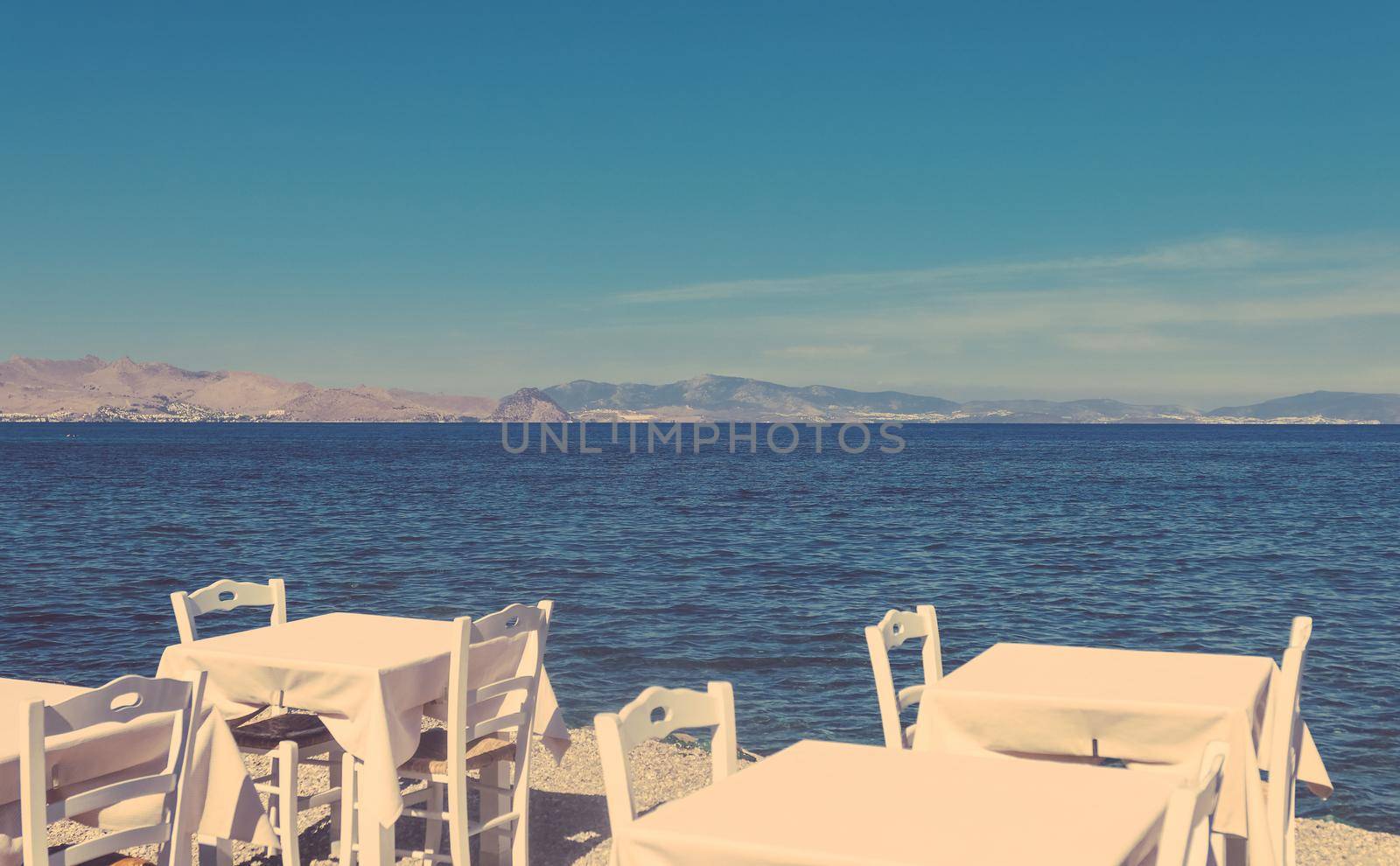 Summer holiday, eating out and beach life concept - Restaurant by the sea, Mediterranean vacation