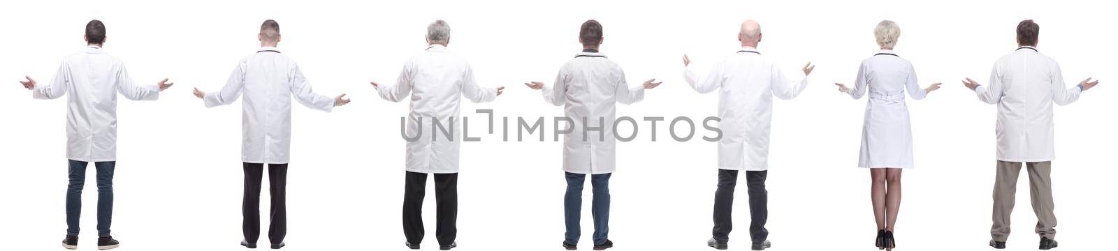 group of doctors standing with their backs isolated on white background