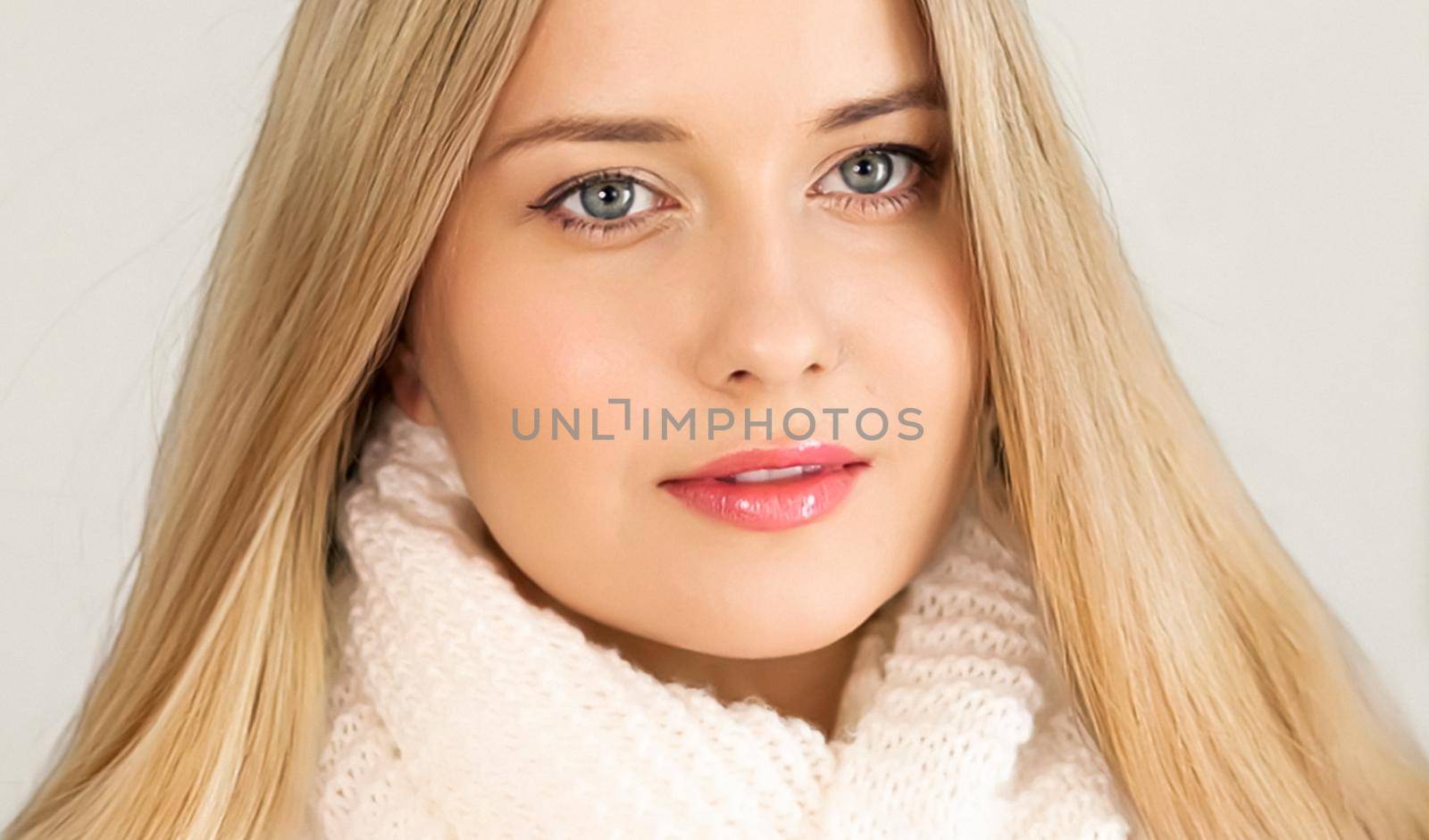 Autumn winter fashion and knitwear, beautiful woman wearing warm knitted scarf, close-up portrait