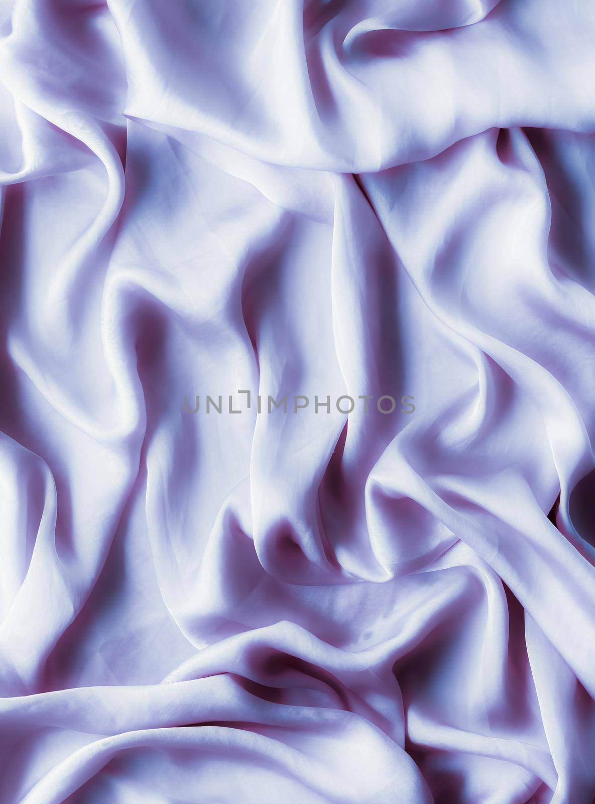 Elegant fabric texture, abstract backdrop and modern pastel colours concept - Purple soft silk waves, flatlay background