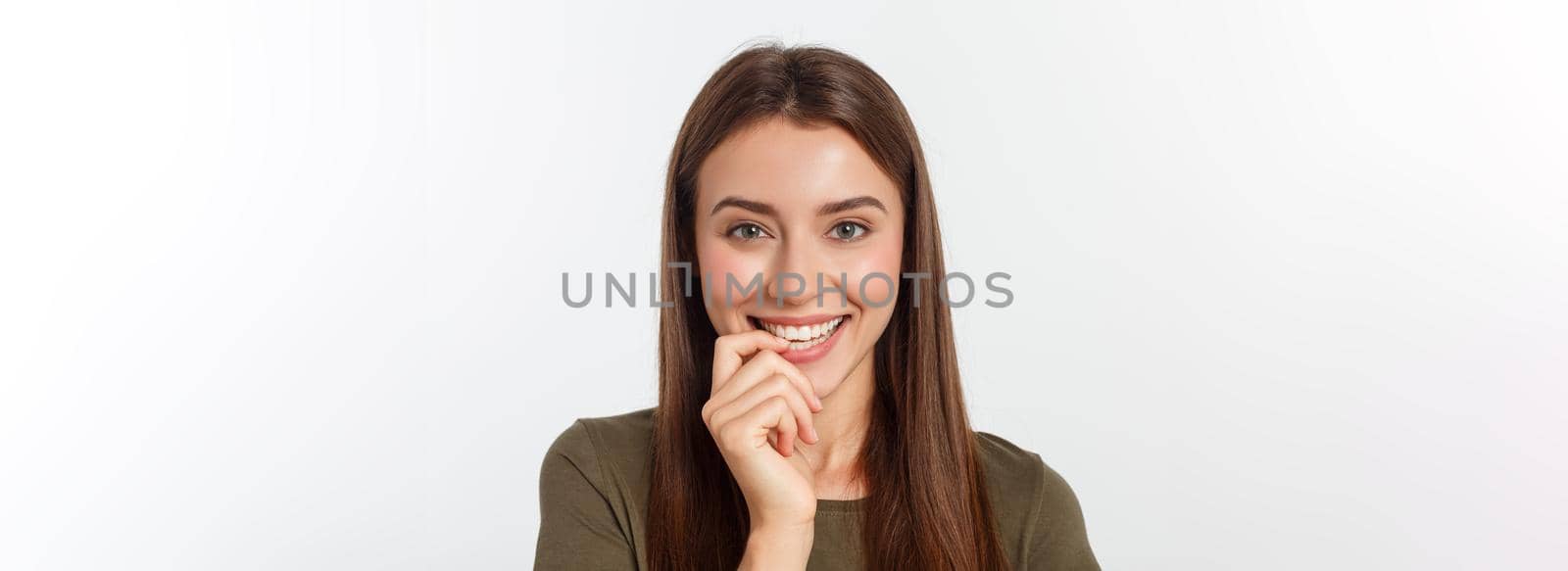 Close-up portrait of yong woman casual portrait in positive view, big smile, beautiful model posing in studio over white background. by Benzoix