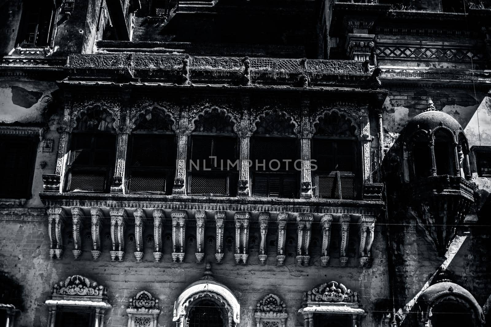 Architectural symmetrical shot of windows of an old building.