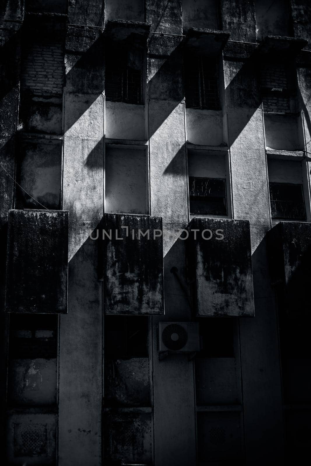 Architectural symmetrical shot of windows of an old building.