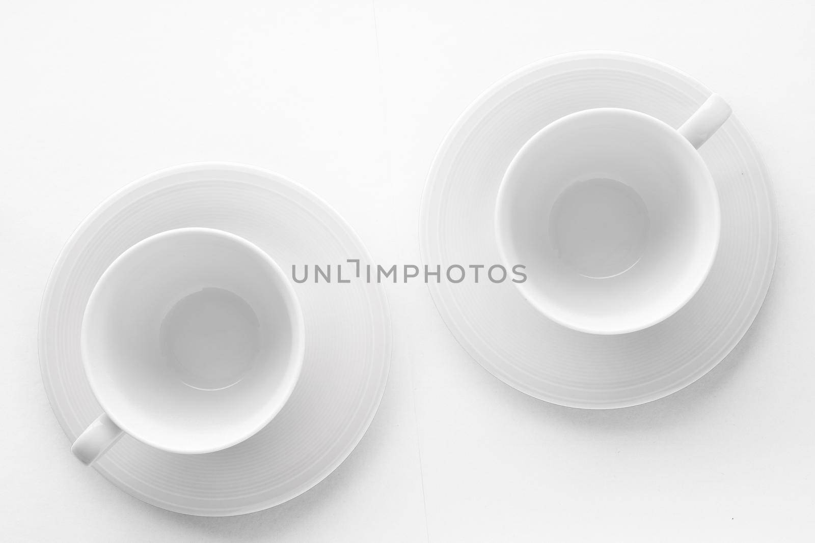 Kitchen, dishware design and drink concept - Empty cup and saucer mockup on white background, flatlay