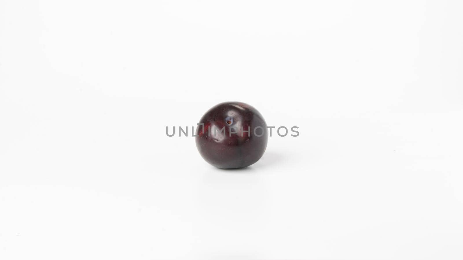 Plum cherry berries fruit on white background. High quality photo