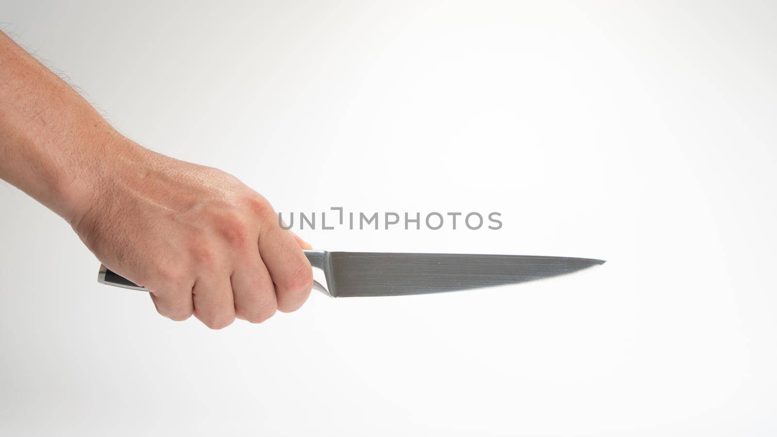 A man's right hand holds a kitchen knife gesture by voktybre