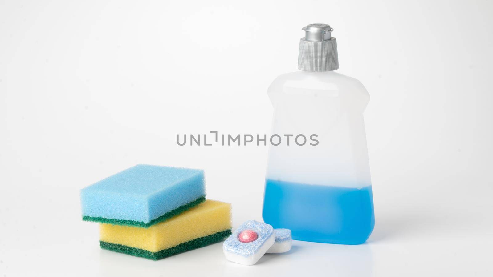 Sponges, detergent and tablets for dishwasher on a white background set for cleaning and washing by voktybre