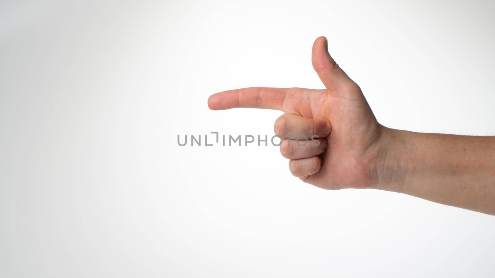 Male hand gesture folded like a gun insulated on a white background by voktybre