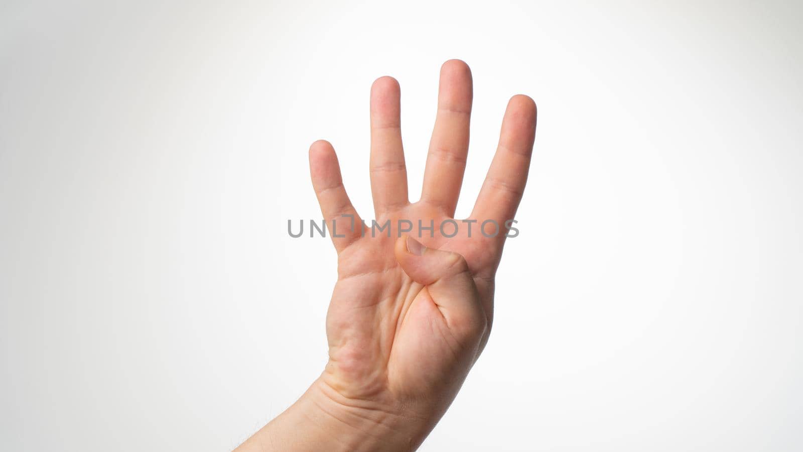 Men's hands gesture counting on fingers 4 palmar side. High quality photo