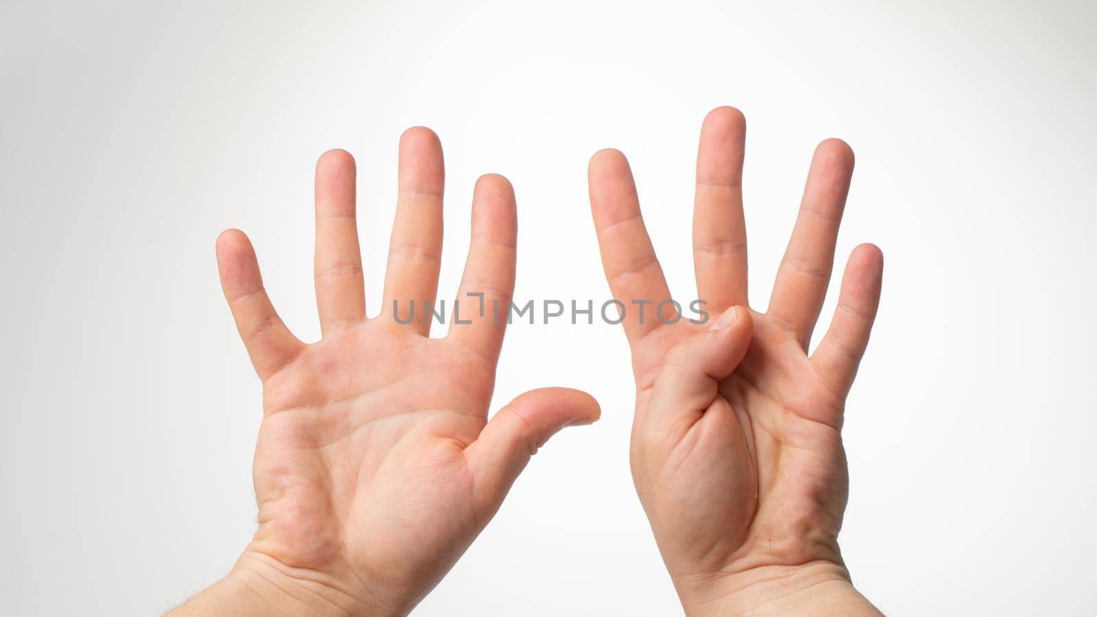 Men's hands gesture counting on fingers 9 palmar side. High quality photo