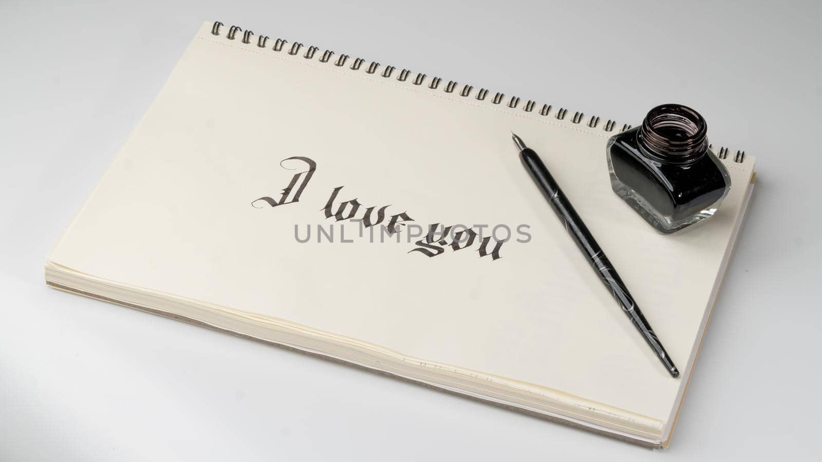 Calligraphy inscription I love you with ink and fountain pen by voktybre