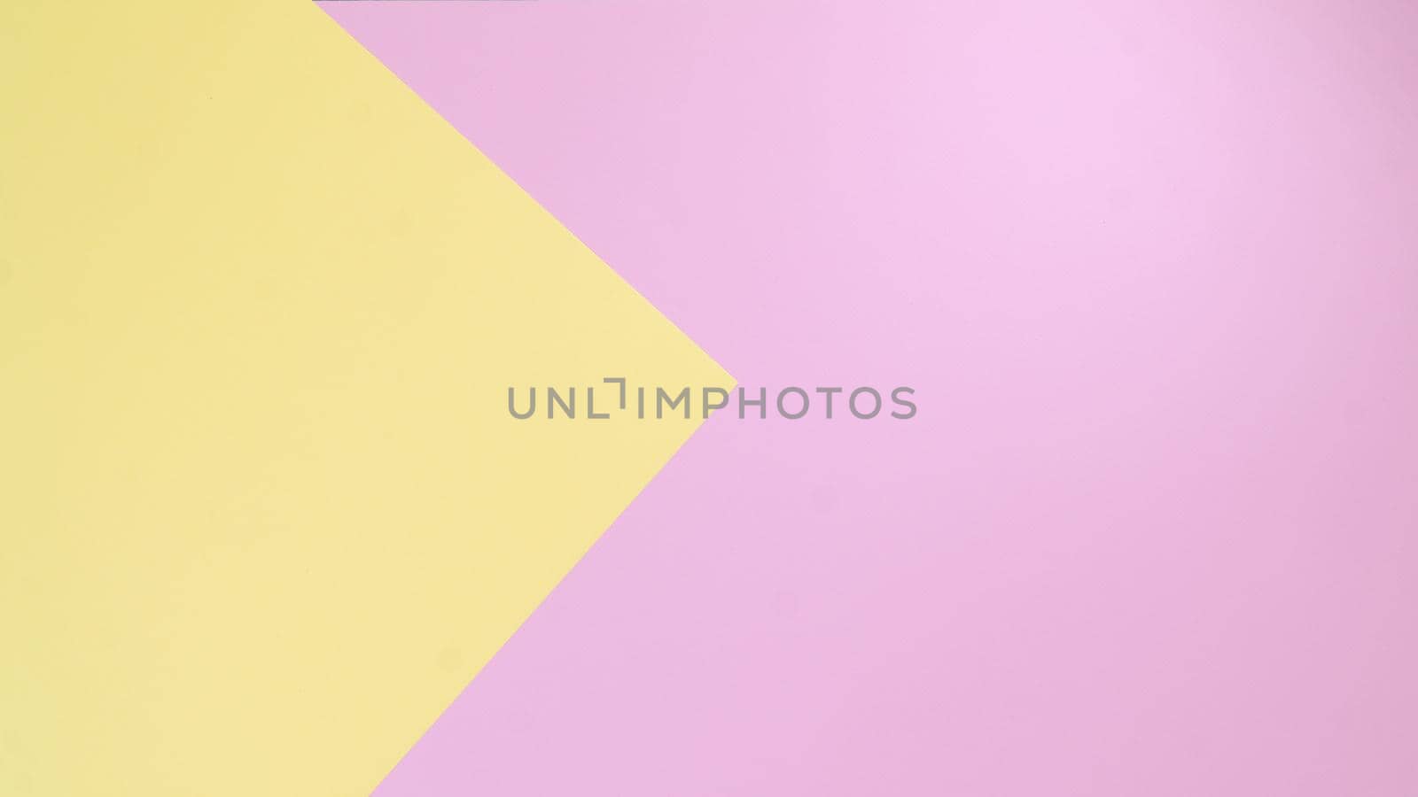 Background envelope in delicate shades of yellow and pink. High quality photo