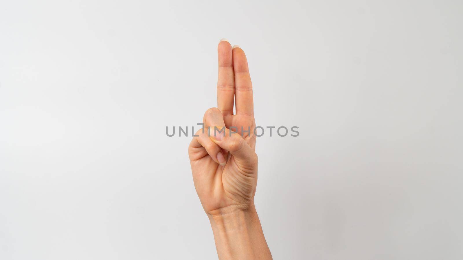 Sign language of the deaf and dumb people, English letter u. High quality photo