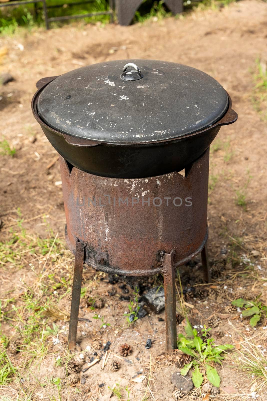 A cauldron for cooking outdoors. Oriental cuisine. traditions of the east. cooking pilaf