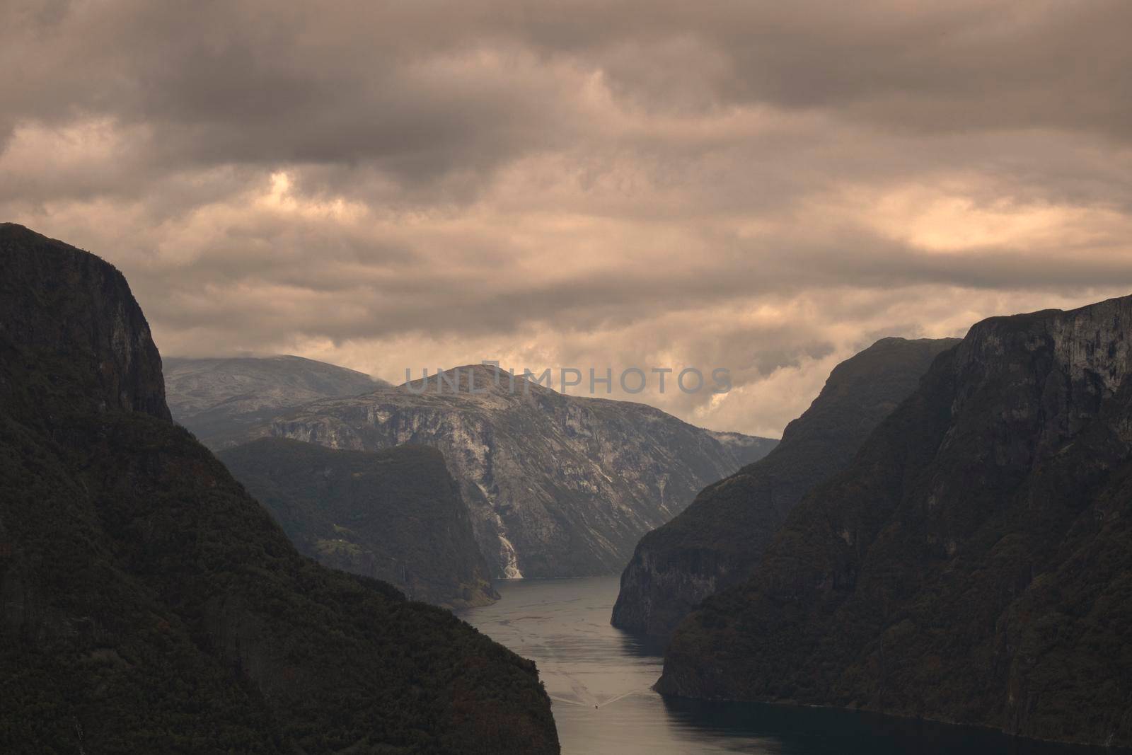 Stormy landscape showing Aurlandsfjord among some mountains from Stegastein viewpoint in Norway