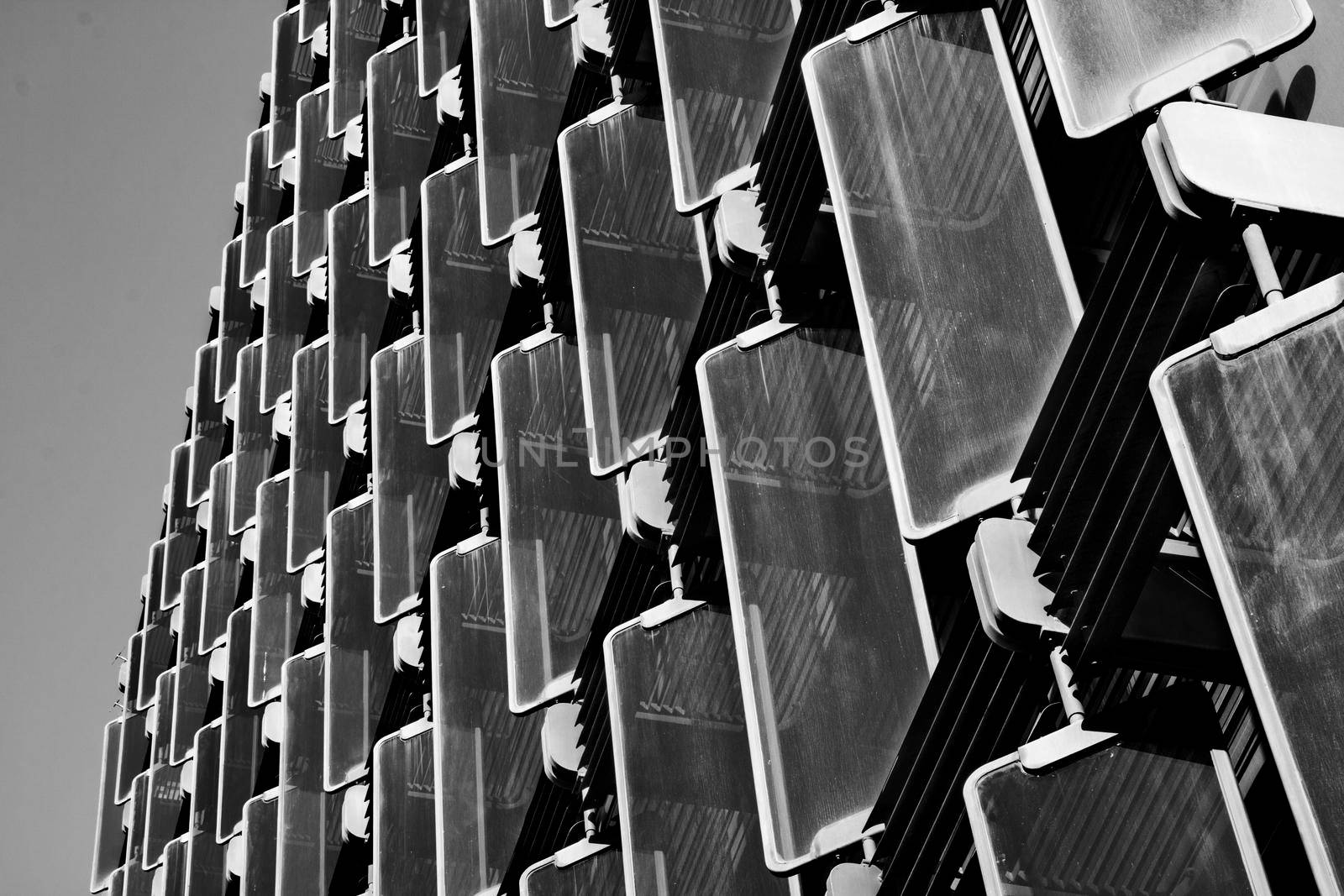 Modern facade and windows of a building in Barcelona in black and white