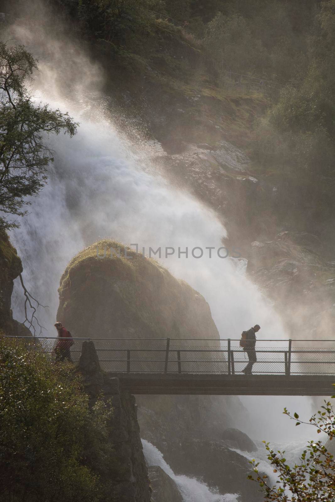 Walking next to the waterfall by ValentimePix