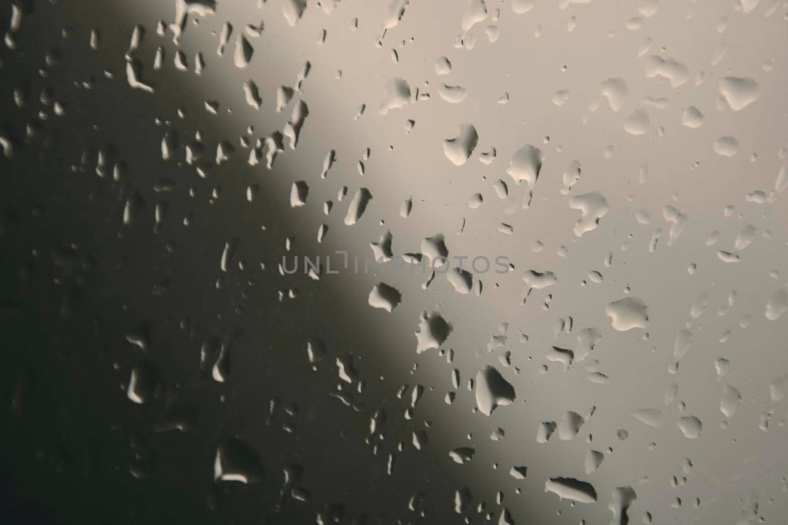 Wet window full of water drops by ValentimePix