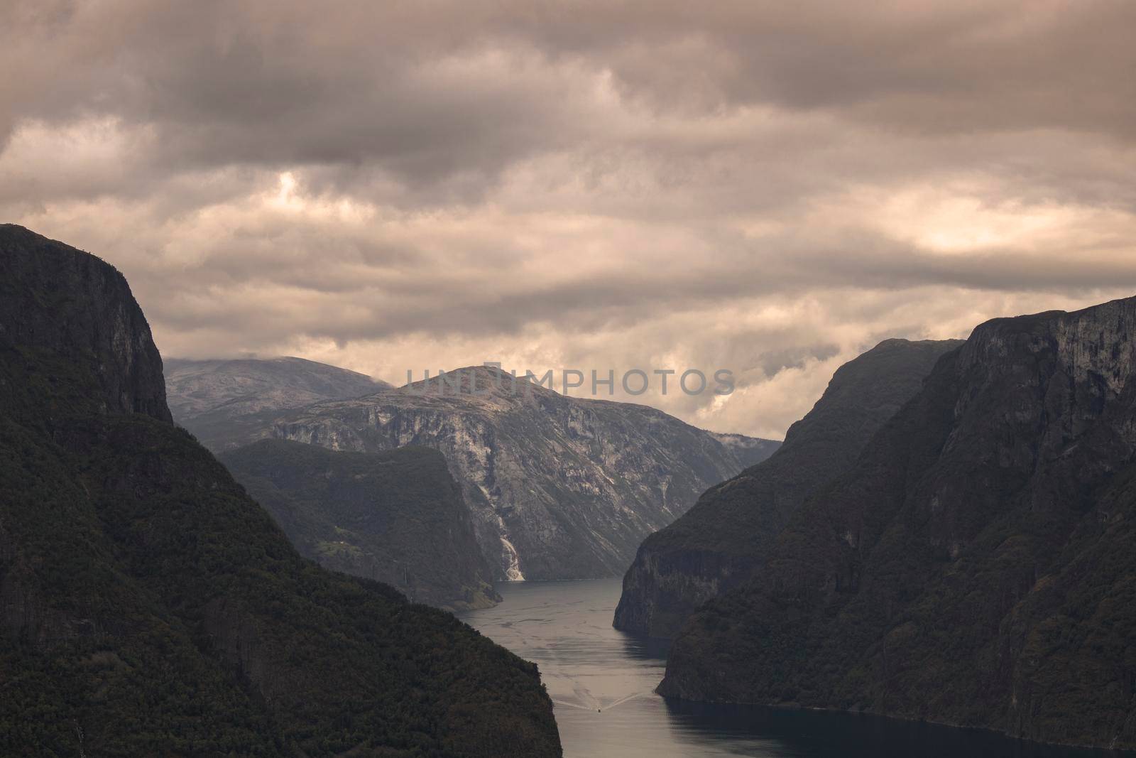 Mountains around Aurlandfjord with cloudy sky from Stegastein viewpoint