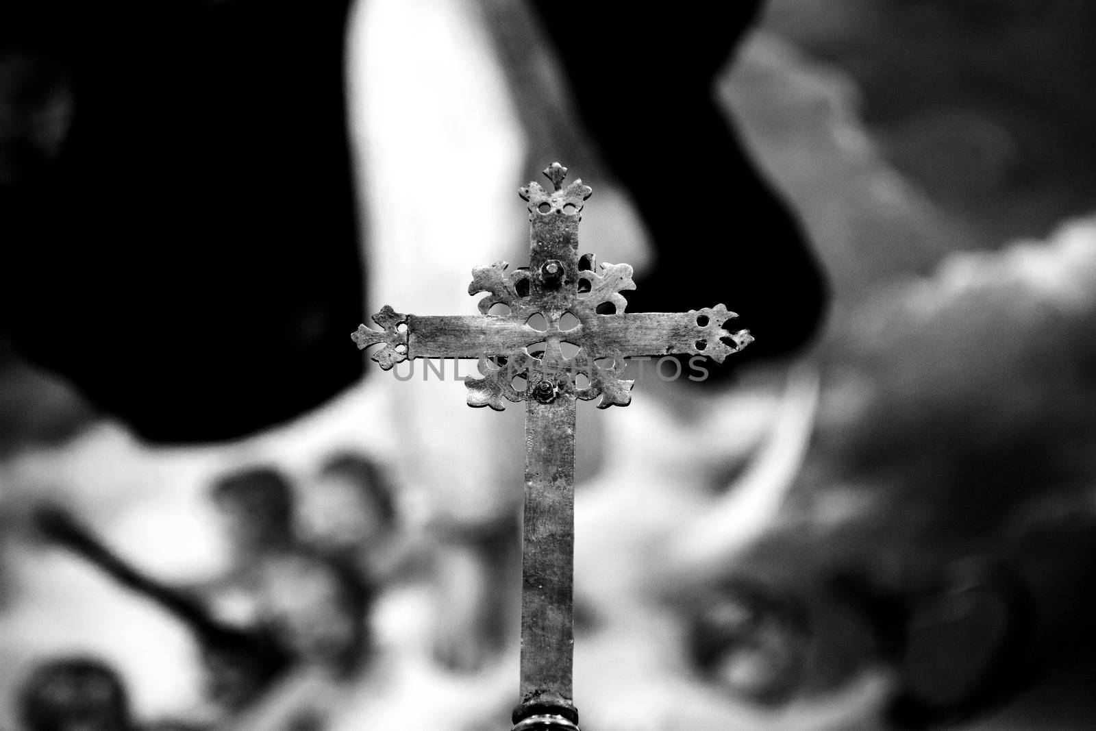 Christian cross in a church in black and white