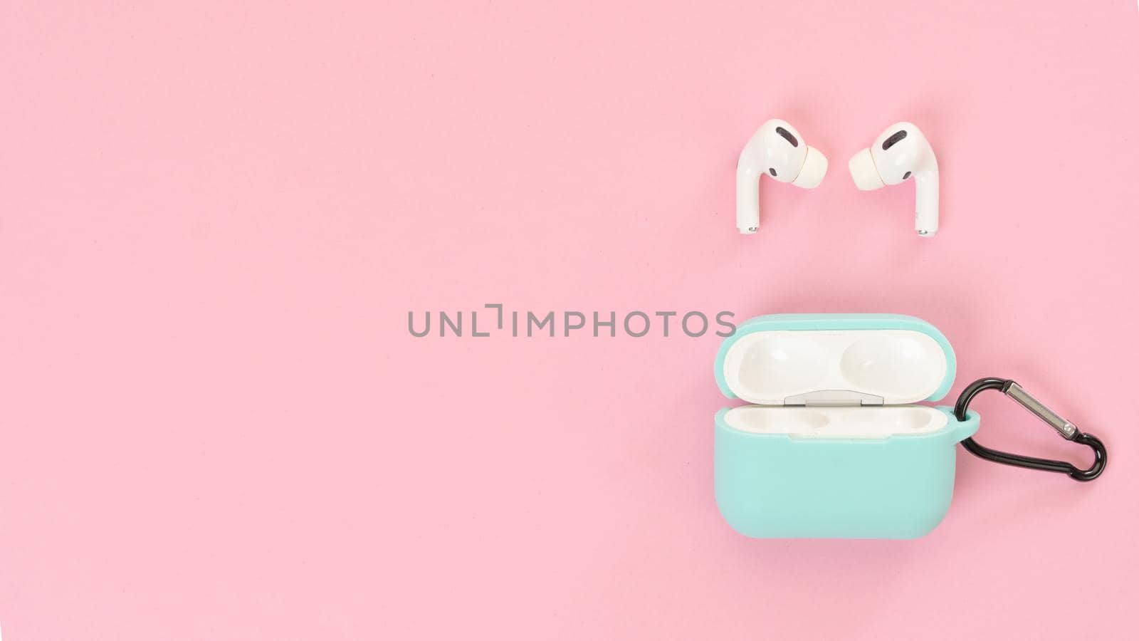 Wireless headphones and a pink case with space for inscription by voktybre