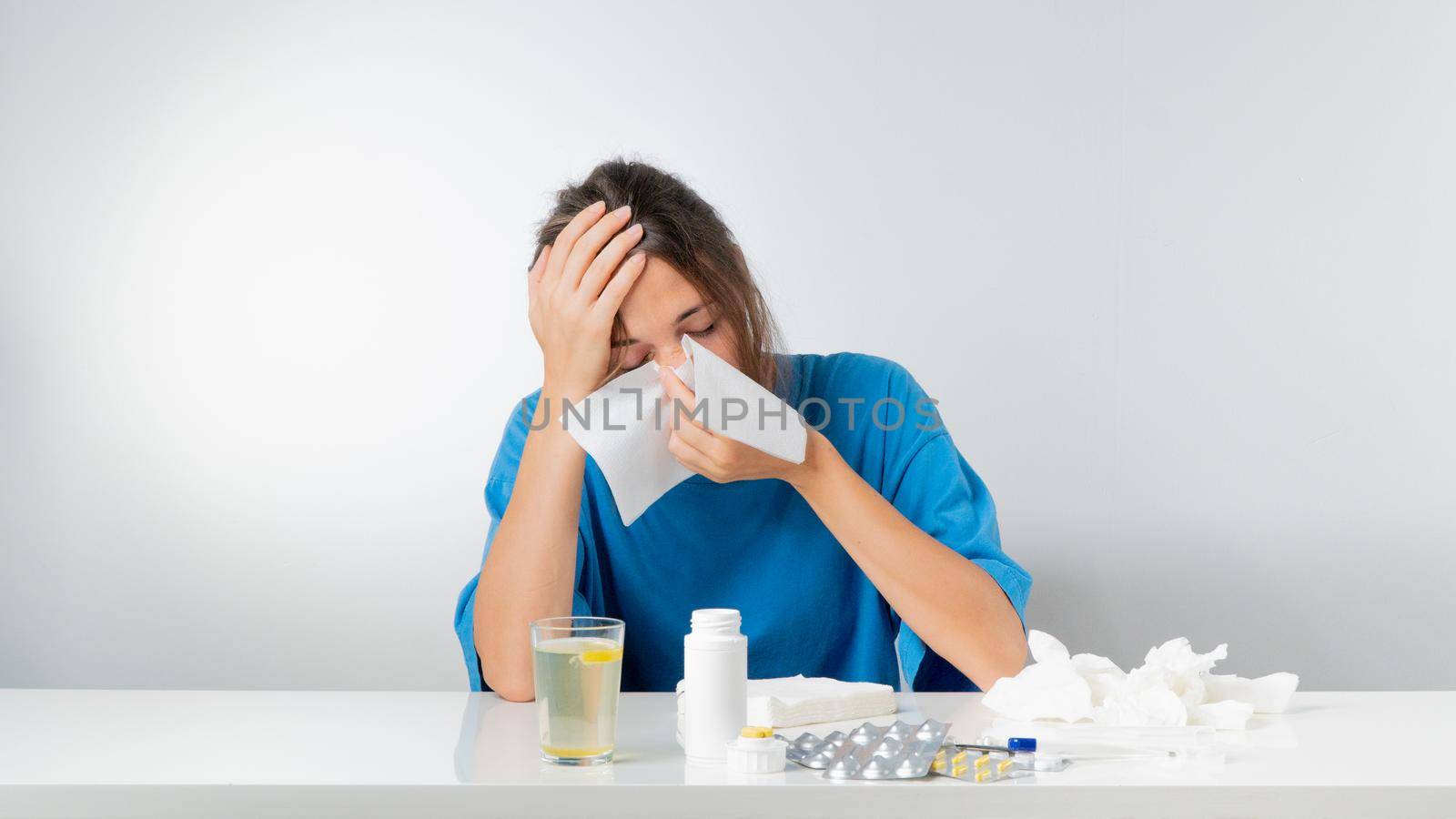 Sick woman feels bad - flu, runny nose, medication treatment. High quality photo