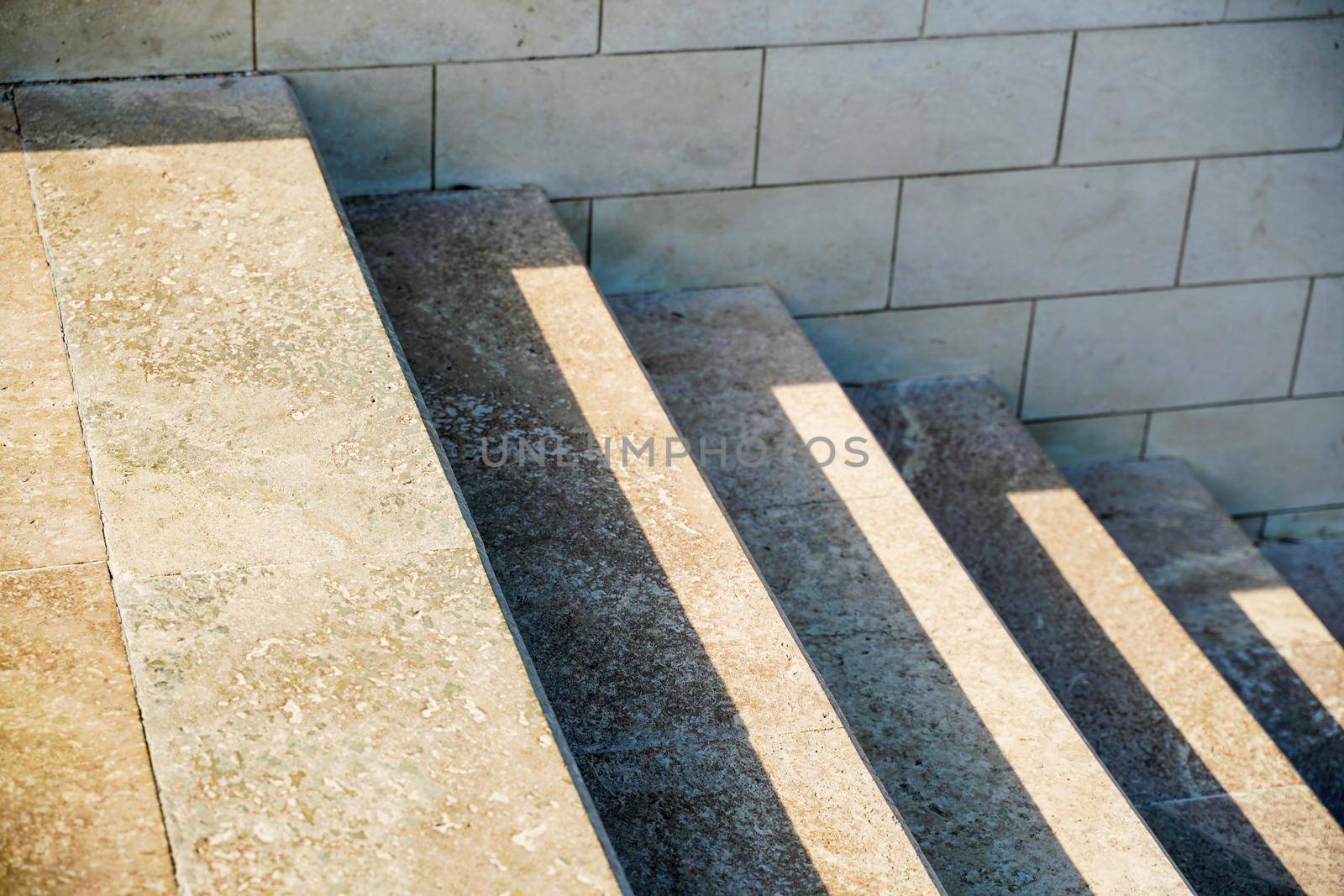 Staircase in the city, black and white pattern on the stairs on a sunny day