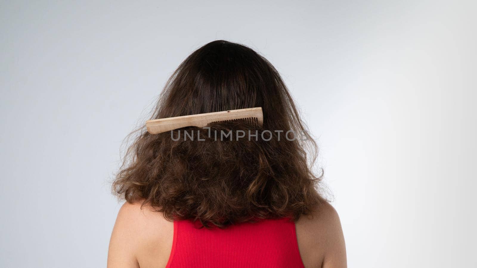 Comb stuck in a woman's matted hair, scratching problems by voktybre