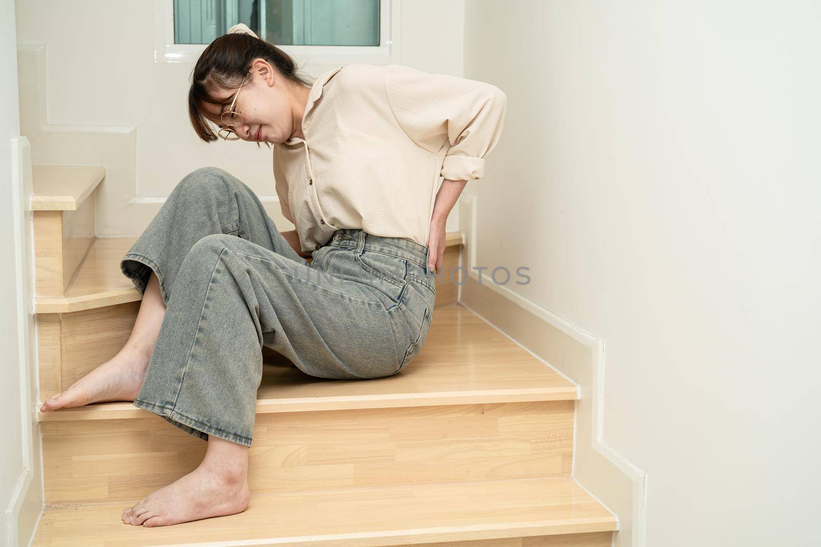 Asian lady woman patient fall down the stairs because slippery surfaces