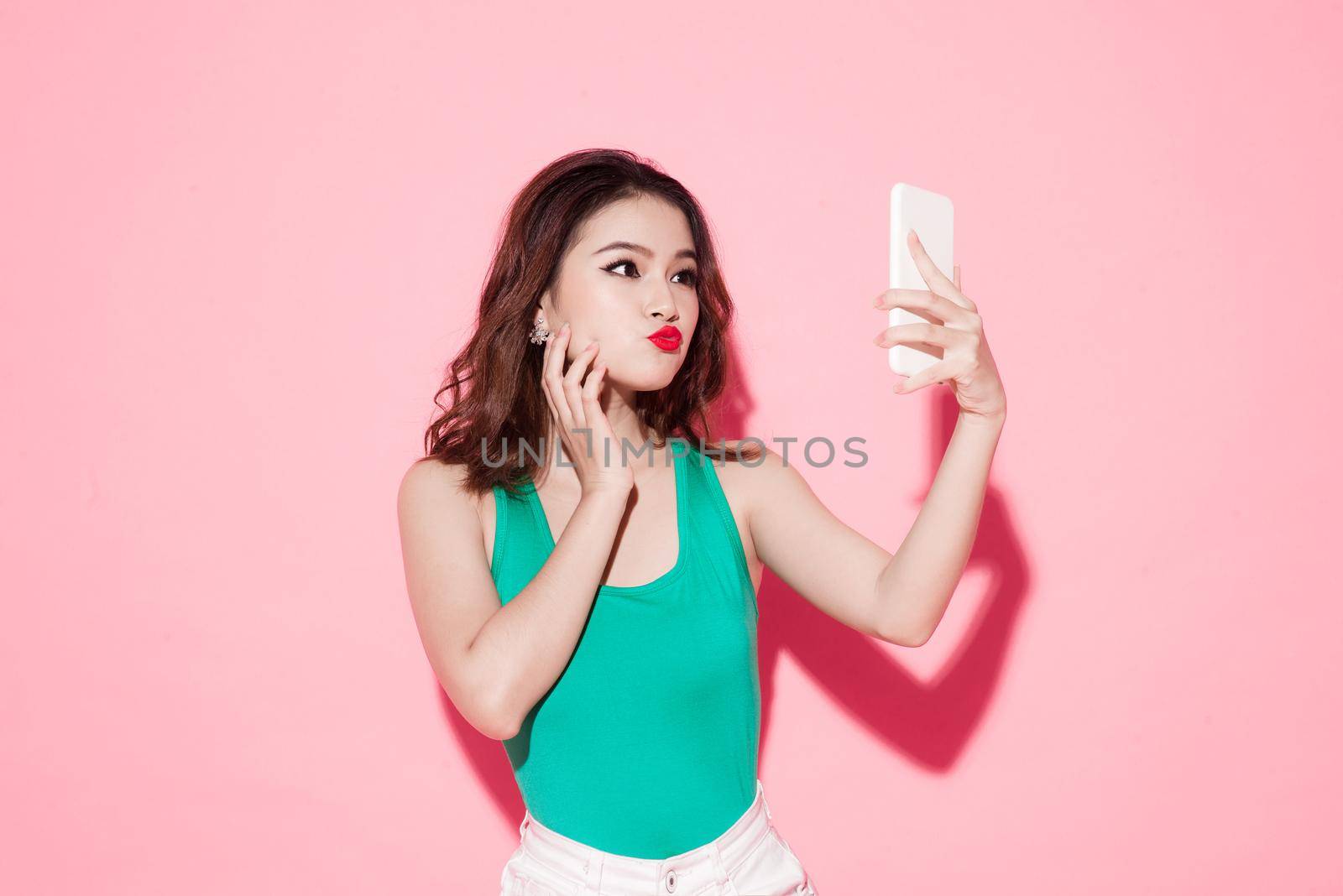 a beauty girl taking selfie