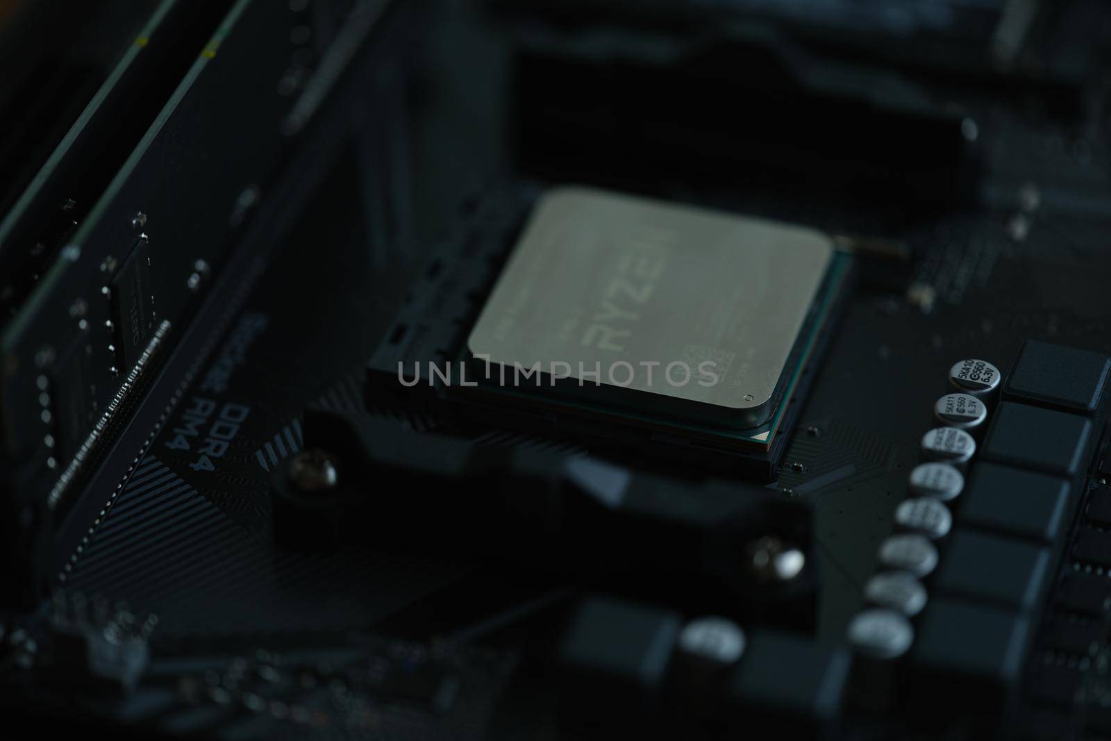 Tbilisi, Georgia - July 26, 2022: Closeup of AMD Ryzen processor motherboard by kuprevich