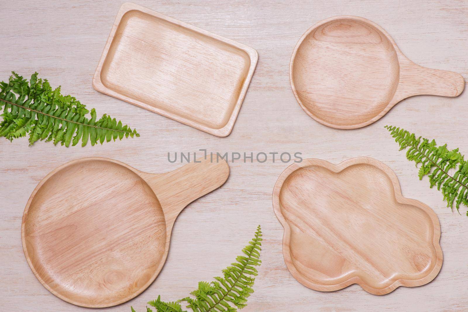 Set of wooden kitchenware on table by makidotvn