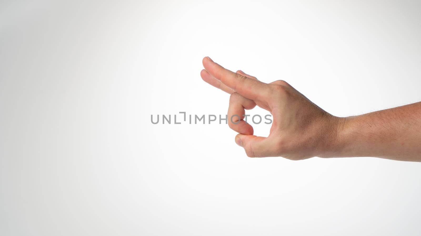 Male hand gesture slitban on white background. High quality photo