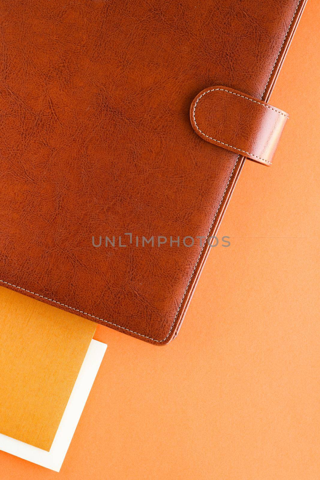 Modern workspace, productivity and corporate lifestyle concept - Luxury business brown brief-case on the office table desk, flatlay