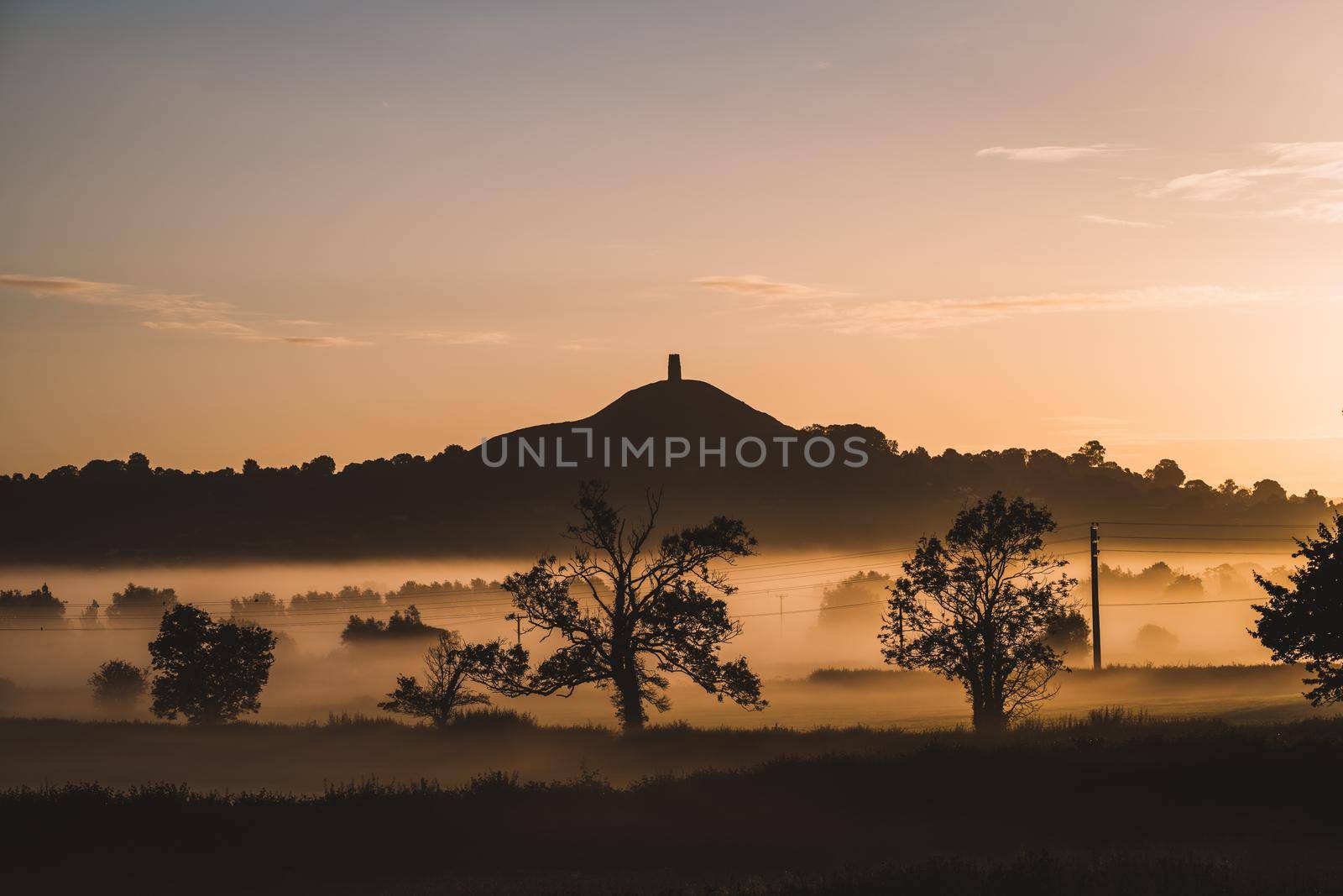 Glastonbury Tor on sunrise, United Kingdom. High quality photo