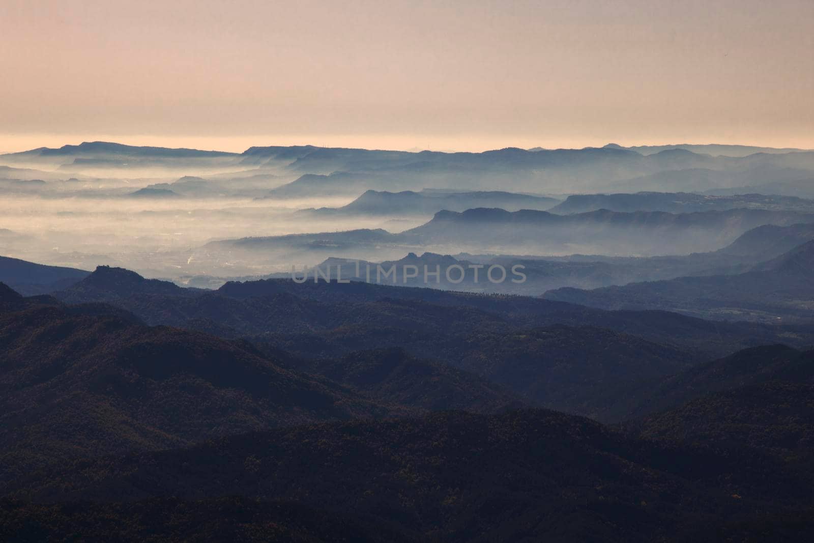 layers of mountains among the mist by ValentimePix