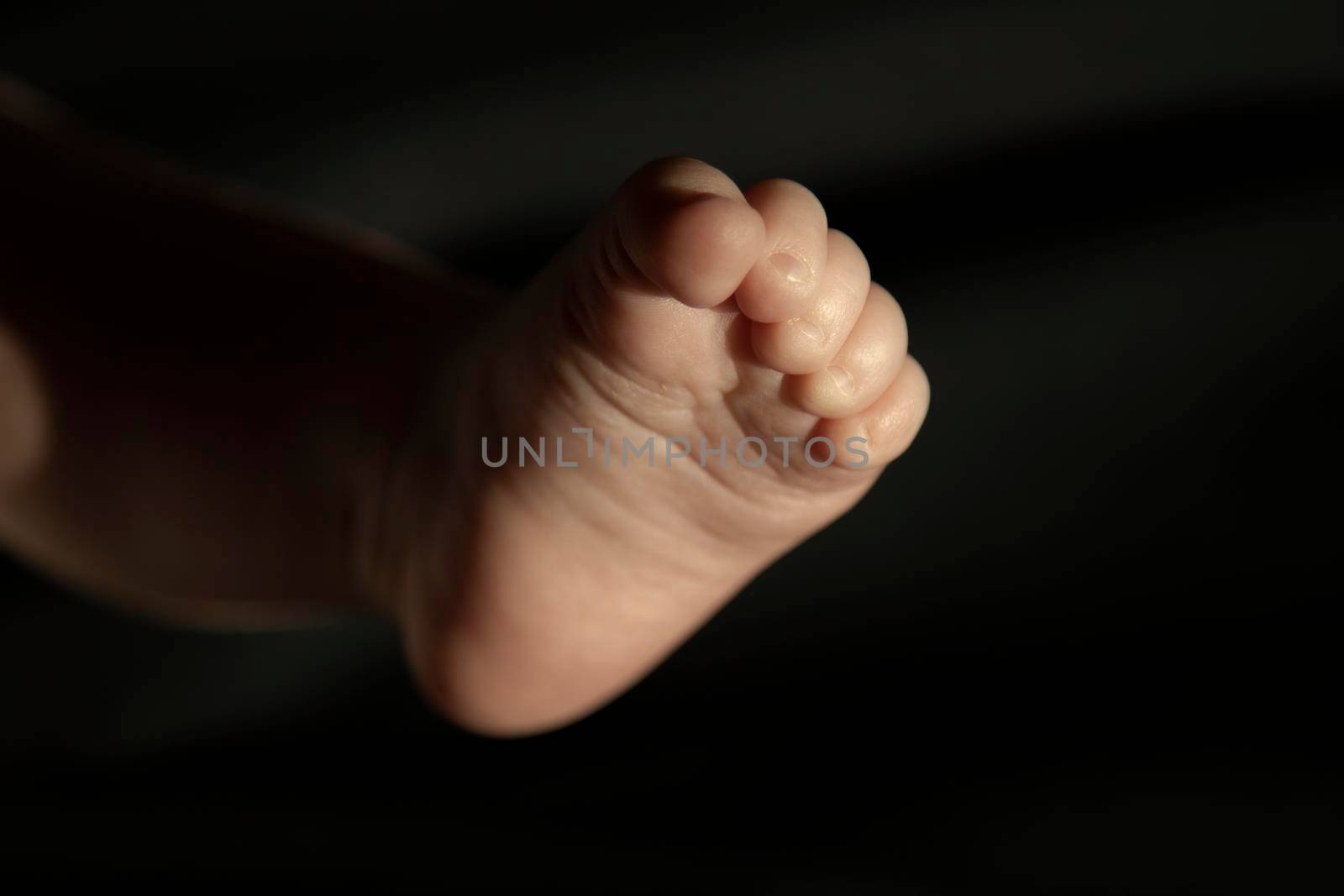 Tender image of a baby foot by ValentimePix